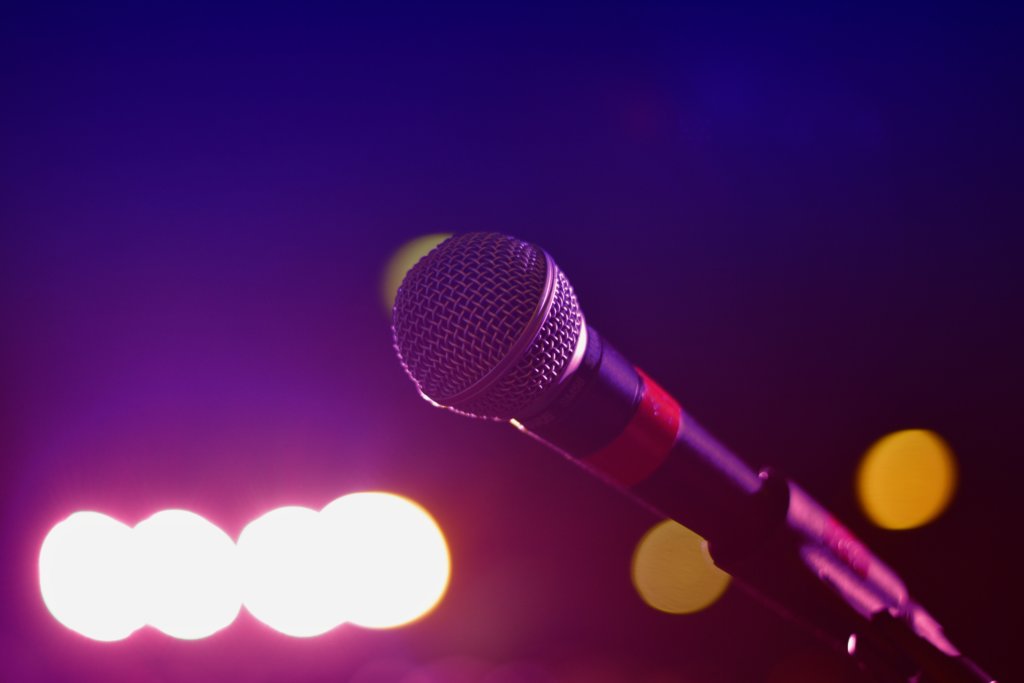 A stock photo of a microphone to represent audio/visual providers.