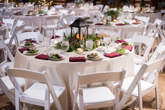 A table decorated for a corporate holiday party.