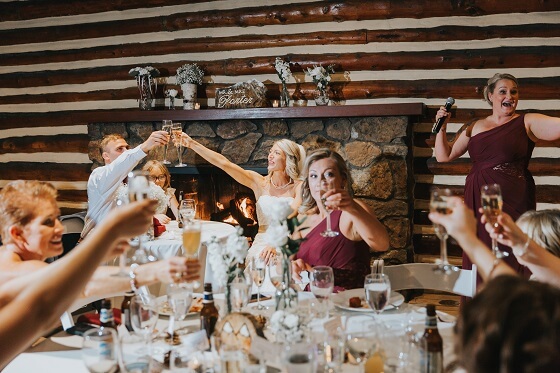 Wedding toast inside the Inn at Hudson Gardens