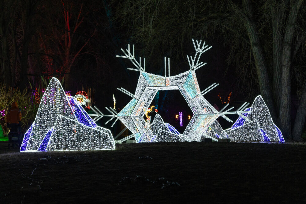 Snowy mountain and snowflake holiday light displays
